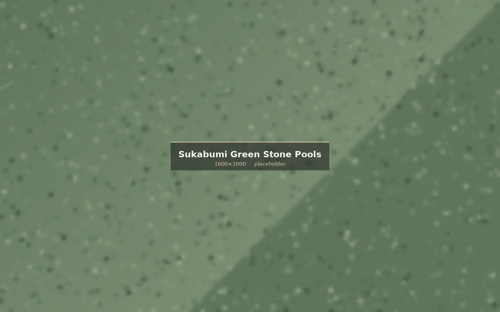 Swimming pool clad in Sukabumi green stone with water reading emerald green