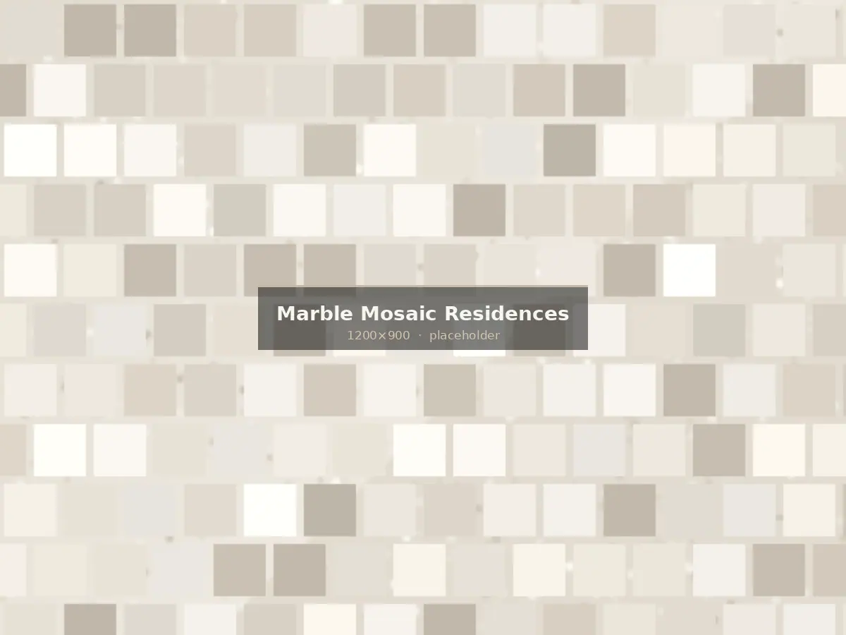 Marble herringbone mosaic shower wall in a residential unit