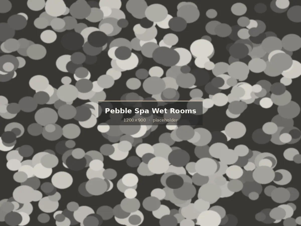 Pebble mosaic shower base falling to a central waste